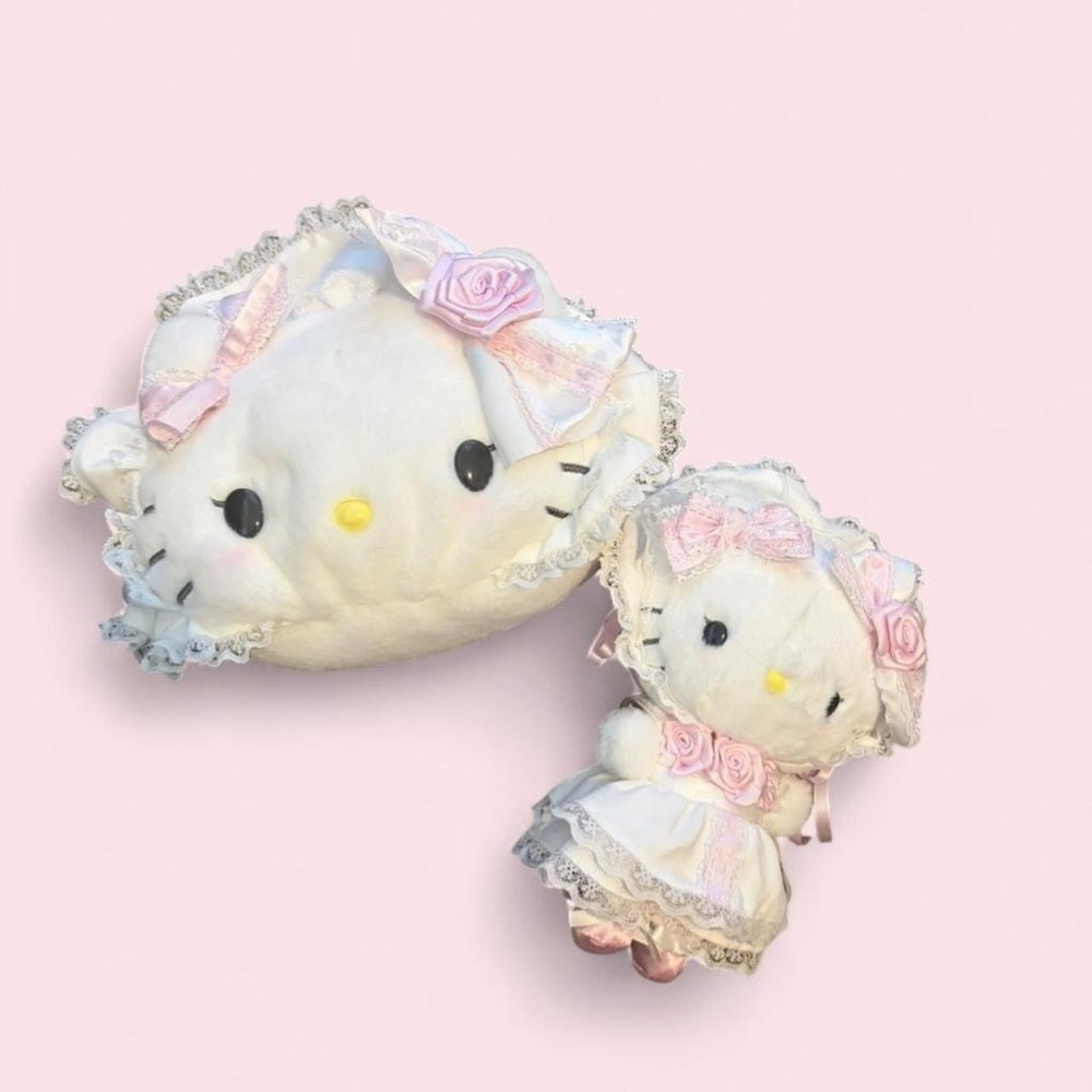 Hello kitty Lolita mascot keychain and matching pouch